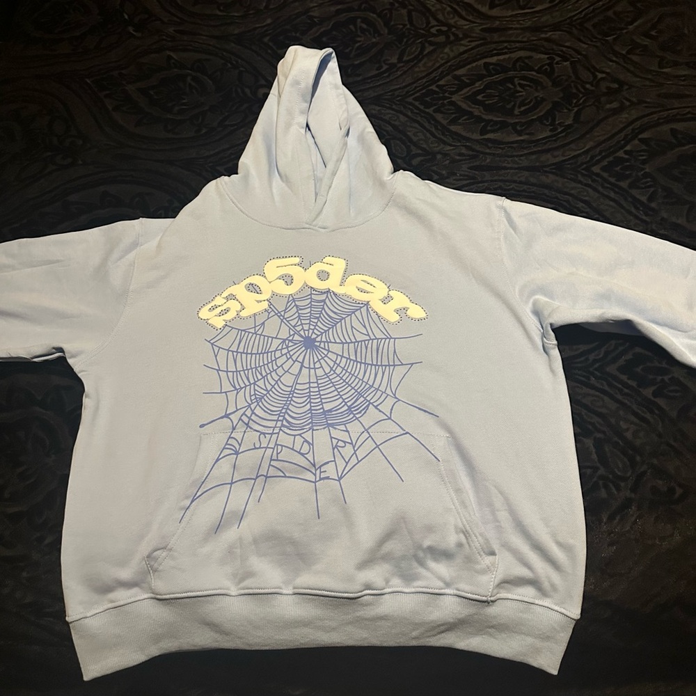 Blue Sweater with Stylized Spider Web Design brand new
